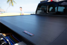 Load image into Gallery viewer, Roll-N-Lock 2020 Chevy Silverado / GMC Sierra 2500-3500 77-3/8in E-Series Retractable Tonneau Cover