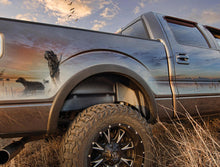 Load image into Gallery viewer, Husky Liners 14-15 Chevy/GMC Silverado/Sierra Black Rear Wheel Well Guards