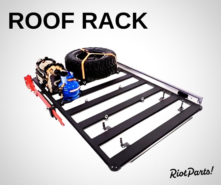 Roof rack with a spare tire, gas canister, and hi-lift jack for off-road storage.